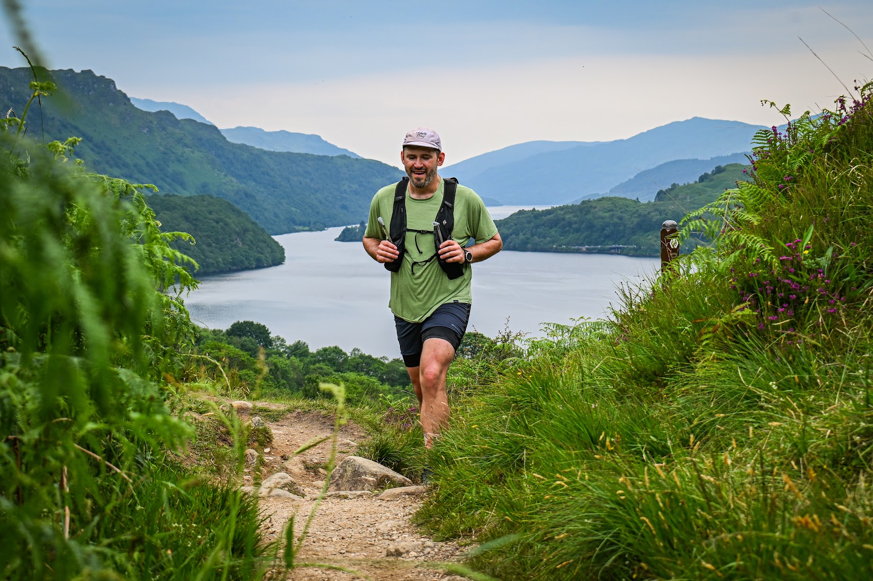 Jacob Wolniewicz running above Loch Lomond during the 2025 West Highland Way Race.